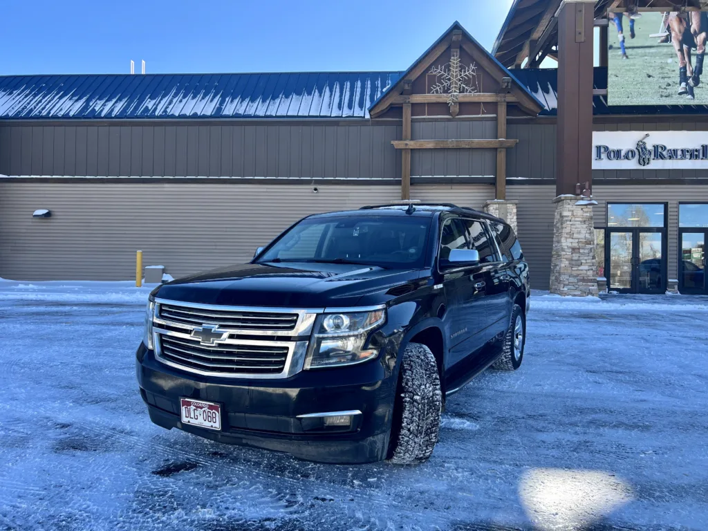 Luxurious limousine service route from Denver to Vail with Snow